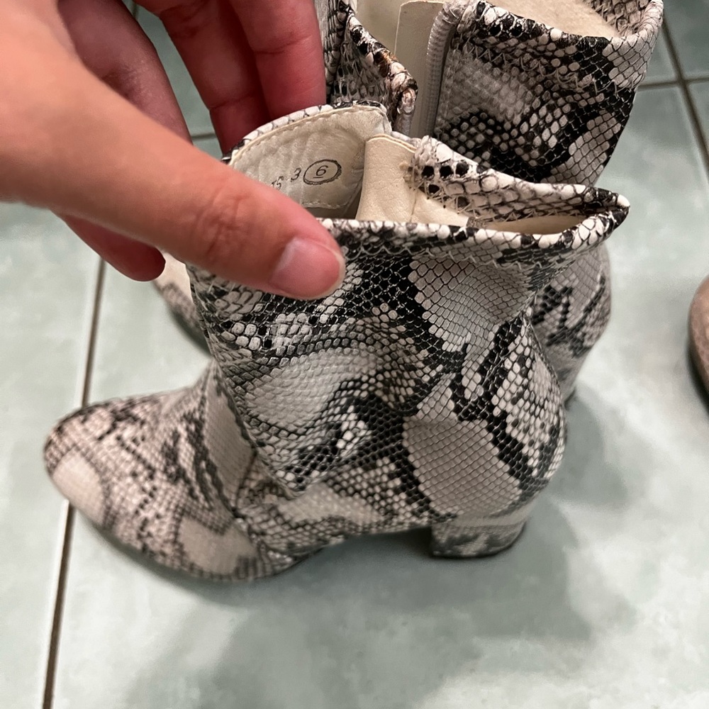 Snake skin heeled boots